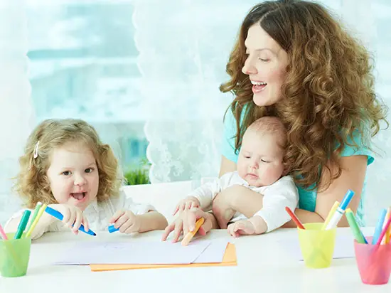 Image of mother and two children